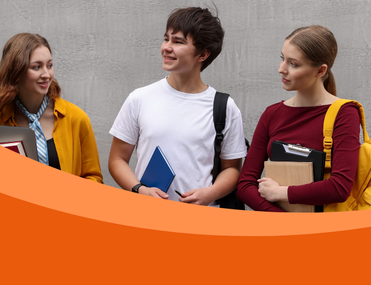 Group of three young people of different ethnicities with backpacks stand in front of grey wall