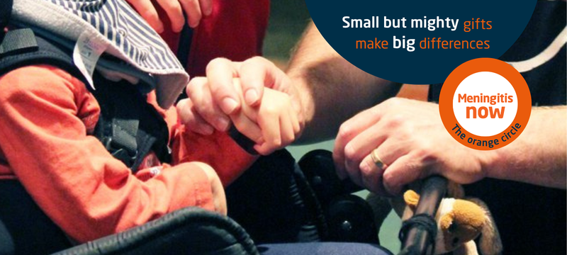 A child's hand holds an adult's finger, conveying care and connection. Text reads "Small but mighty gifts make big differences" with "Meningitis Now" logo.