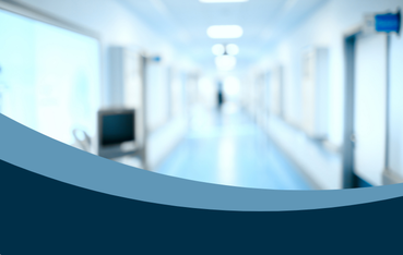 Blurry photo of generic hospital corridor going into distance