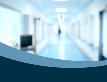 Blurry photo of generic hospital corridor going into distance